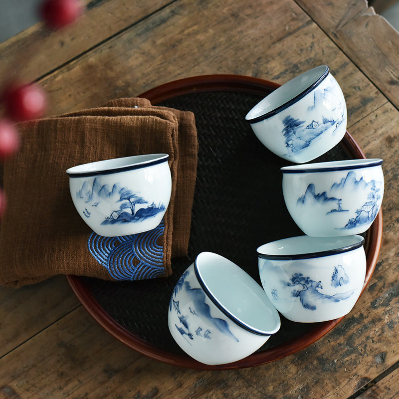 Koi Landscape Teacup – Side angle showing koi fish, lotus and tree, ceramic
