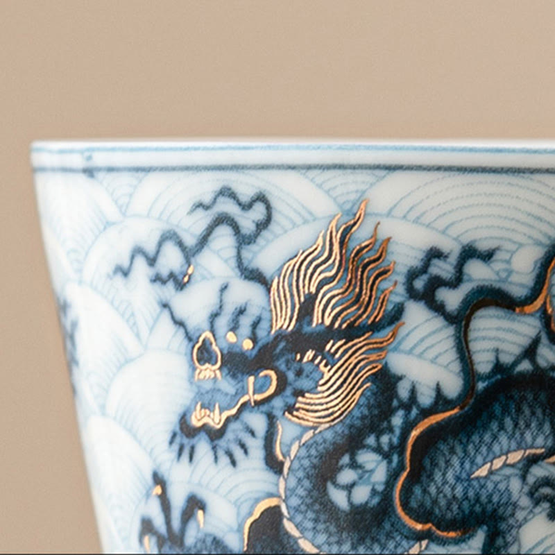 Blue & White Dragon Ceramic Teacup – macro close-up dragon head with gold gilt, cobalt detail, collectible