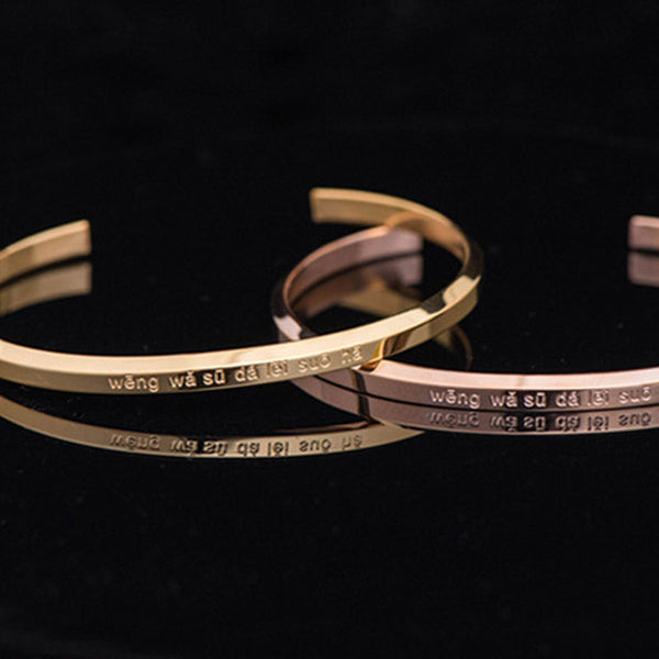 Om Mani Padme Hum Engraved Bracelet – gold and rose gold cuffs showing engraved mantra, Tibetan bracelet