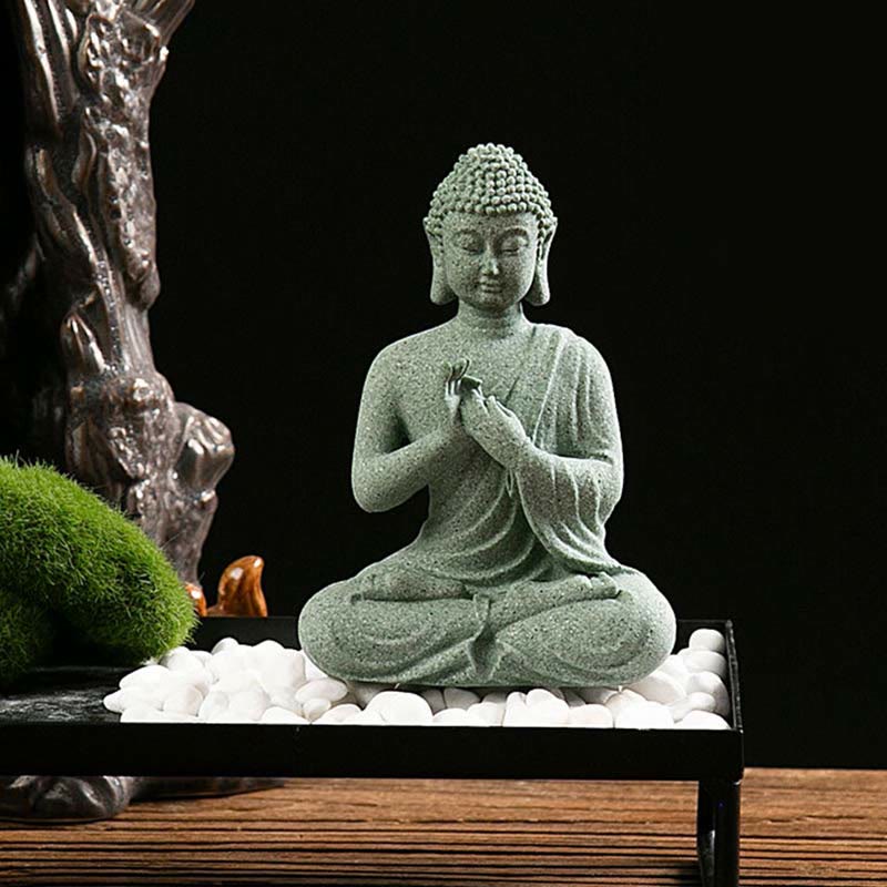 Green Sandstone Buddha Statue – Namaste Buddha on white pebble zen tray, decor scene