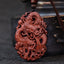 Lightning Jujube Wood Dragon Pendant - 3/4 view of carved dragon in clouds and waves, Protection