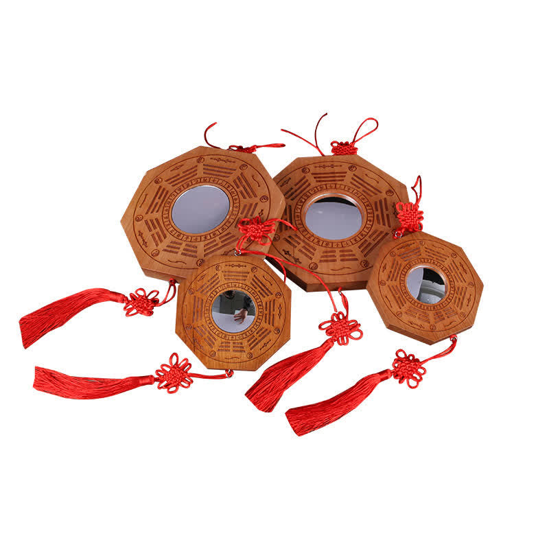Peach Wood Bagua Map - single bagua feng shui mirror with red Chinese knot tassel, carved wood frame