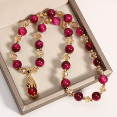 Tiger Eye Pixiu Fox Money Bag Bracelet - double-strand burgundy tiger eye bracelet with champagne crystal accents and gold Pixiu pendant charm, red cat eye beads in gray velvet jewelry gift box