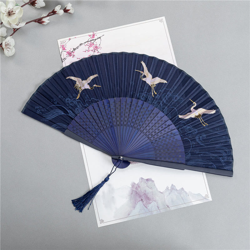 Crane Silk Folding Fan – Navy fan with white cranes in flight over waves, silk folding fan