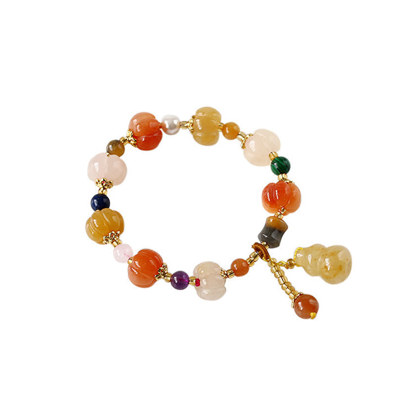 Golden Silk Jade Gourd Bracelet – Isolated multi-color jade bracelet on white