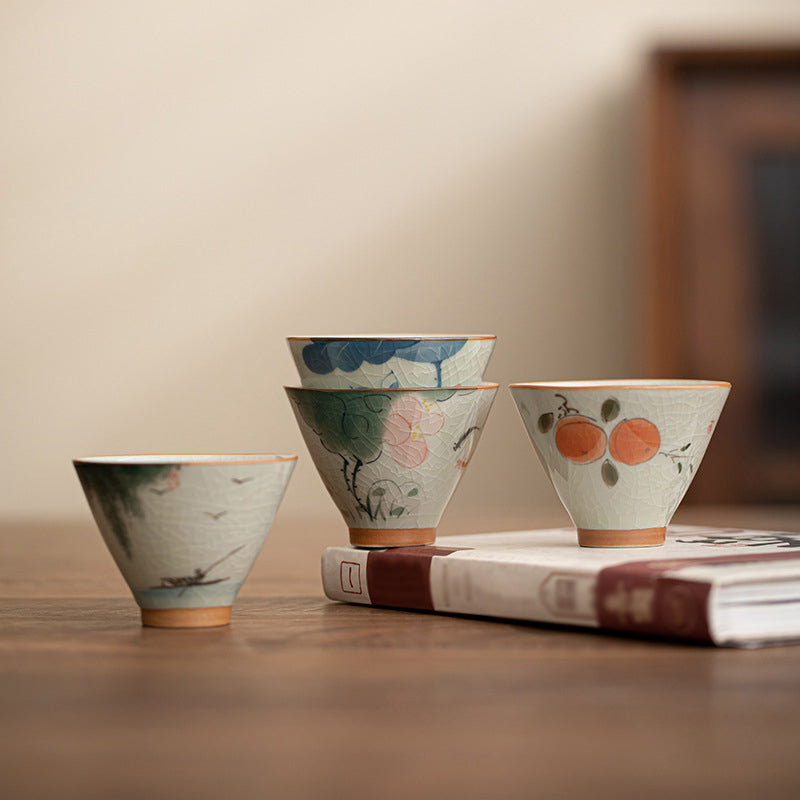 Persimmon Boat Teacup – angled top-down showing persimmon boat and koi fish motif, gaiwan