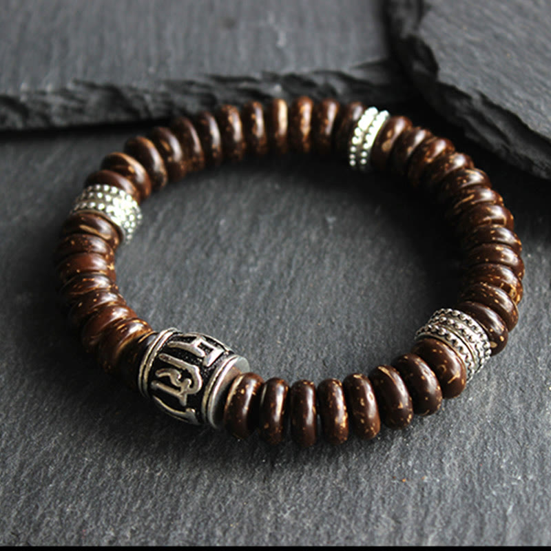 Om Mani Padme Hum Coconut Shell Bracelet – overhead view showing full loop, natural bead bracelet