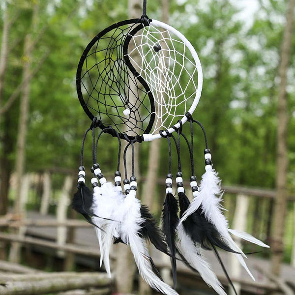 Yin Yang Dream Catcher with Feathers – Beaded dreamcatcher in garden outdoor setting, wall decor