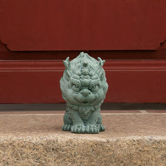 PiXiu Sandstone Statue – Front view on stone steps with red door background, feng shui decoration
