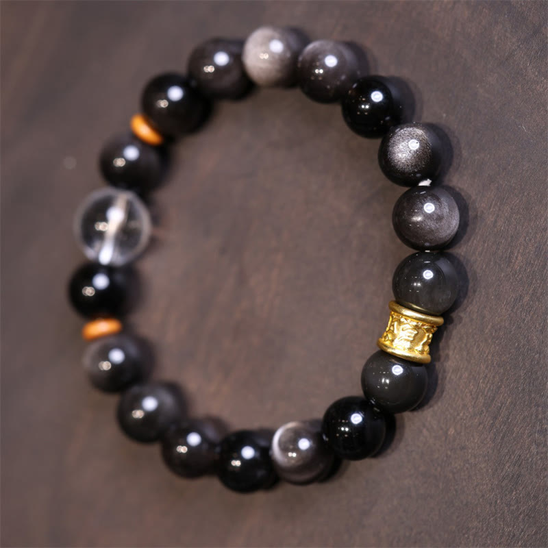 Silver Sheen Obsidian Mantra Bracelet – close-up of mixed obsidian and quartz beads with gold charm, spiritual jewelry