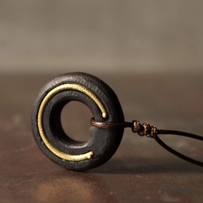 Dark Metal Ring Pendant - gold crescent accent on brown leather cord, hammered texture artisan men's necklace