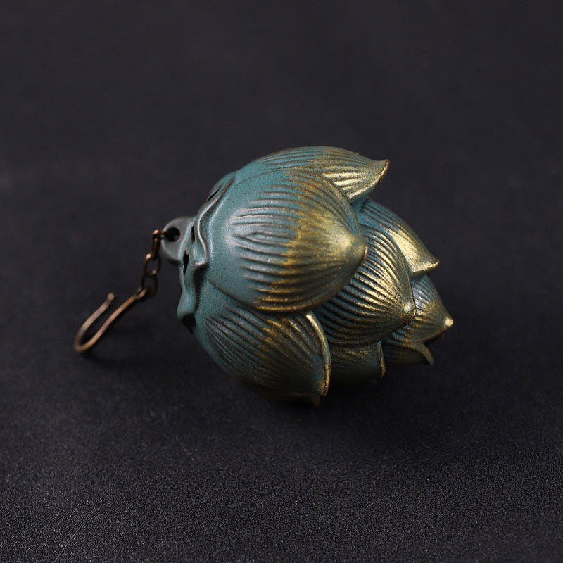 Lotus Hanging Incense Burner - Teal patina lotus bud with clasp hook, dark background, metal decor