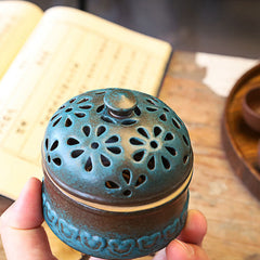 Mini Ceramic Incense Burner - Held in hand showing compact size, patina bronze finish