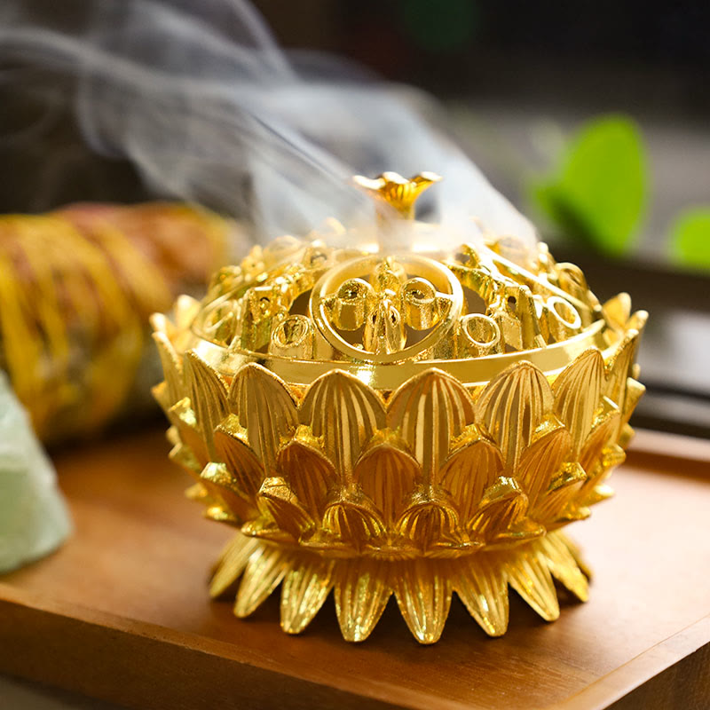 Lotus Incense Burner with wispy smoke, cast metal censer on wood, serene ambiance