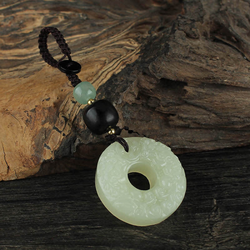 Jade PiXiu Peace Buckle Abundance Key Chain – Jade keychain on wood with white bamboo fan, Asian art style gift
