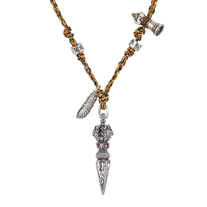 Dorje Vajra Pendant – Front-facing close-up of phurba dagger with red stone accents, ritual jewelry