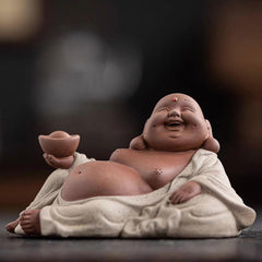 Laughing Buddha Clay Statue – statue holding gold sycee with both hands, wealth attraction symbol