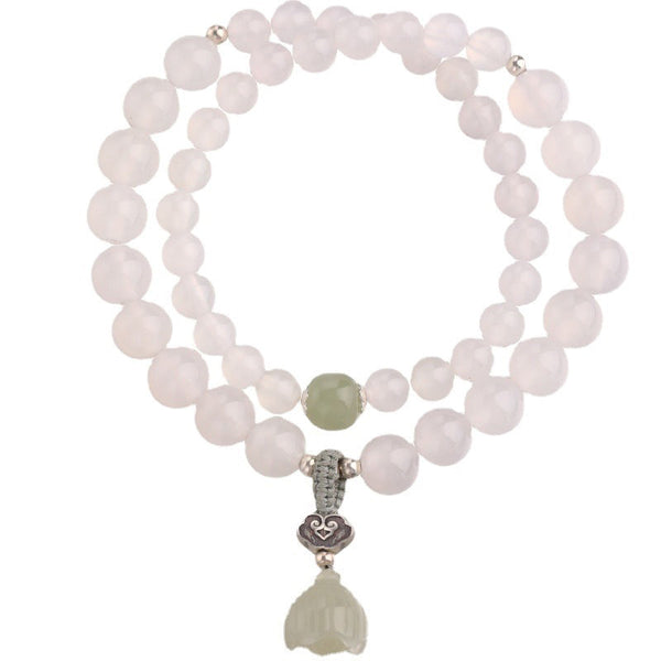 White Agate Jade Lotus Bracelet - Circular layout on white background with silver filigree and lotus bud charm, studio photo