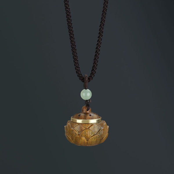Om Mani Padme Hum Necklace – Carved lotus dome pendant with gold metal rim and perforated lid, jade bead, diffuser