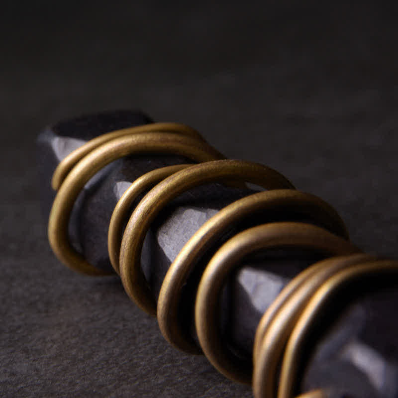 Ebony Wood Pendant Necklace – Gold wire rings on polished dark stone, handmade healing pendant