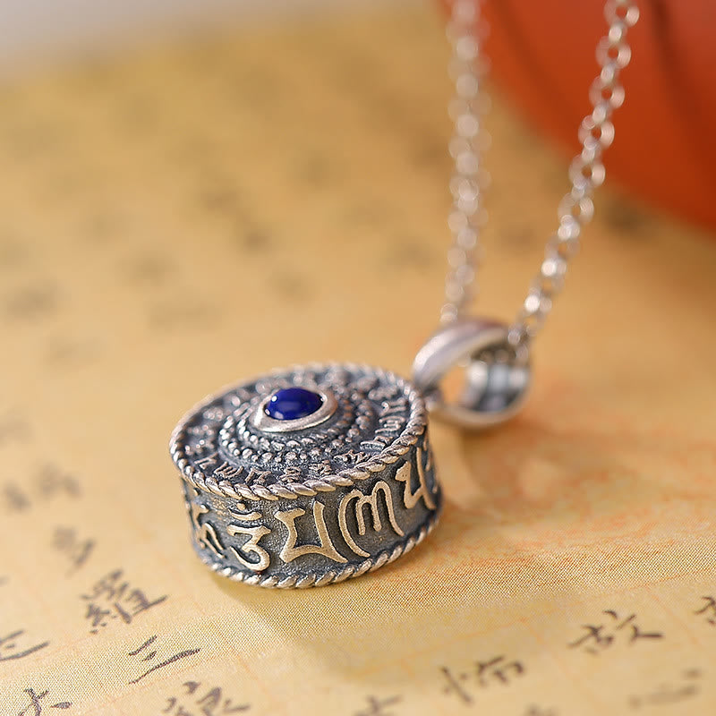 Om Mani Padme Hum Pendant – Side view of cylindrical form with Tibetan engravings, prayer wheel necklace