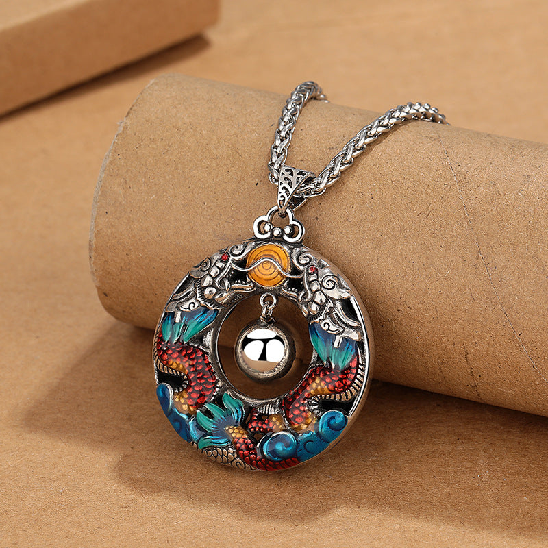 Double Dragon Copper Necklace – Oxidized silver dragon medallion with red blue enamel, harmony ball, kraft display