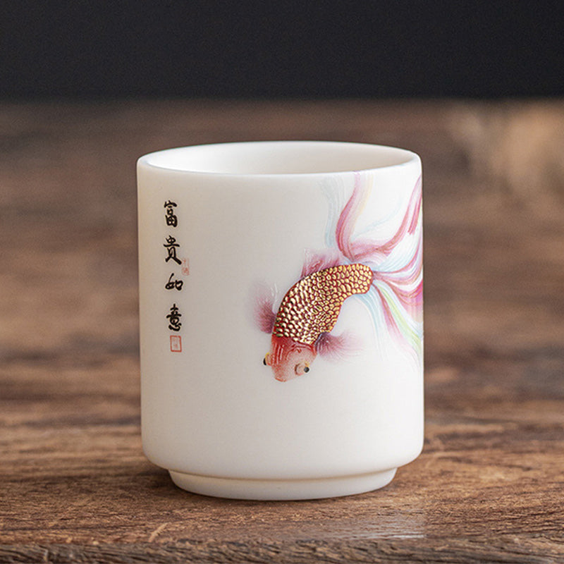Koi Fish Ceramic Tea Cup - golden rim detail accent on white porcelain, elegant tea ware