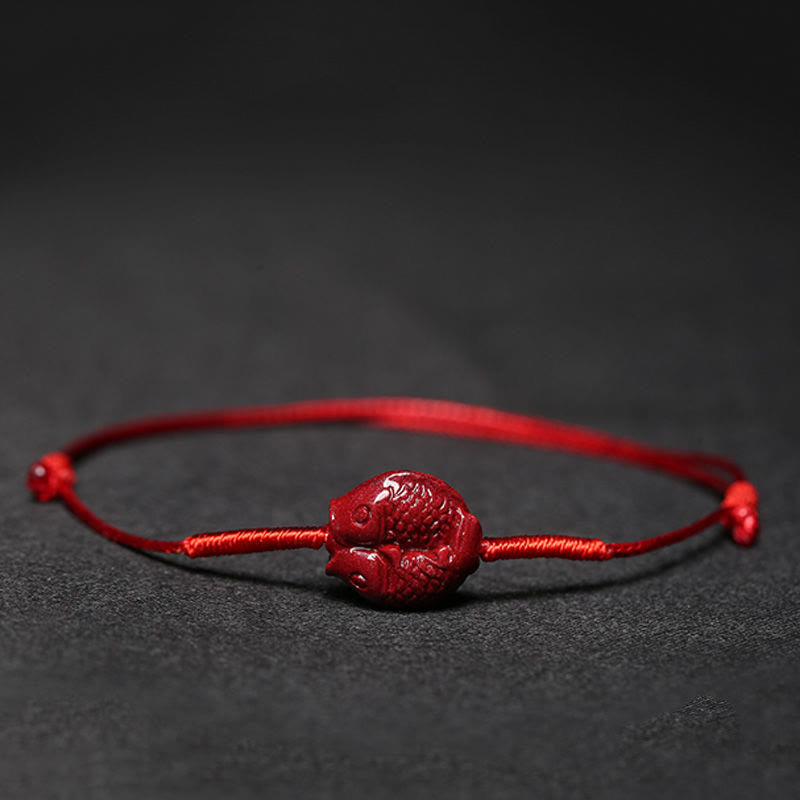 Cinnabar PiXiu Lotus Koi Fish Blessing Braid Bracelet – detailed koi fish pair carving on red string, success determination lucky charm