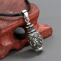 Om Mani Padme Hum Copper Pendant Necklace – Prayer wheel on carved wood stand, meditation pendant