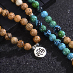 108 Meditation Healing Multilayer Mala – Close-up lotus pendant with brown blue green stone strands, mindfulness