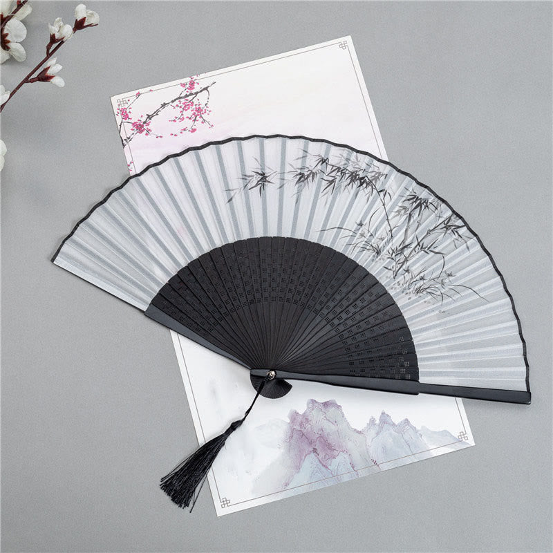 Five Fans Display – Five black folding fans with mountain ink paintings on dark wood, bamboo folding fan