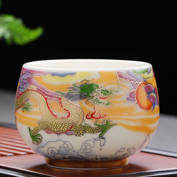 Dragon Phoenix Ceramic Teacup - Green-headed dragon on gold clouds against black, collectible