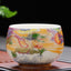 Dragon Phoenix Ceramic Teacup - Green-headed dragon on gold clouds against black, collectible