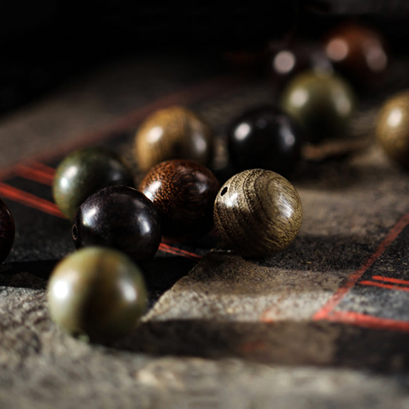 999 Sterling Silver Sandalwood Buddha Bracelet – Mixed sandalwood beads showing green black brown wood grain, natural textures