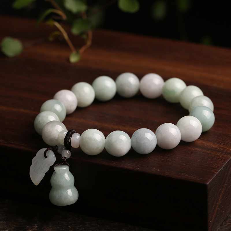 Natural Jade Pi Xiu Buddha Gourd Apple Success Bracelet – gourd and leaf pendant arrangement on wood, luck charm