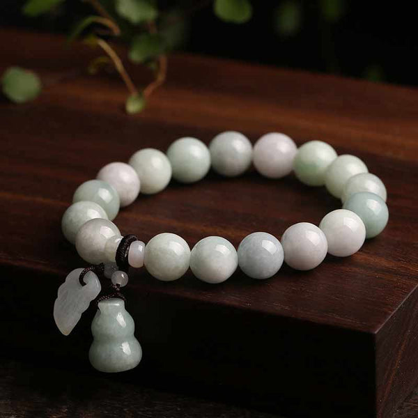 Natural Jade Pi Xiu Buddha Gourd Apple Success Bracelet – gourd and leaf pendant arrangement on wood, luck charm