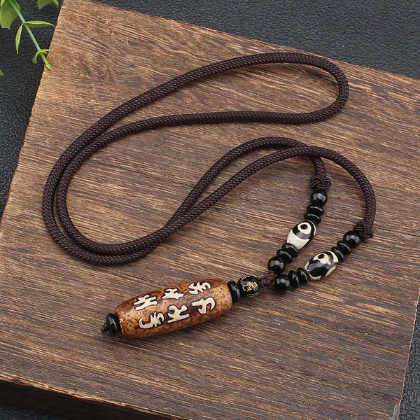 Dzi Bead Necklace – Six-syllable mantra pendant on woven brown cord with accent dzi beads, compassionate