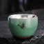 Butterfly Koi Lotus Cup – angled top-down showing goldfish and lotus, teaware