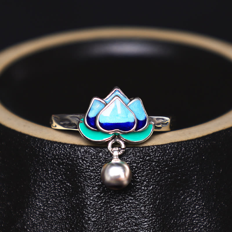 Lotus Flower Copper Ring - gradient blue enamel lotus flower on black textured surface, mindful