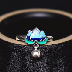 Lotus Flower Copper Ring - gradient blue enamel lotus flower on black textured surface, mindful
