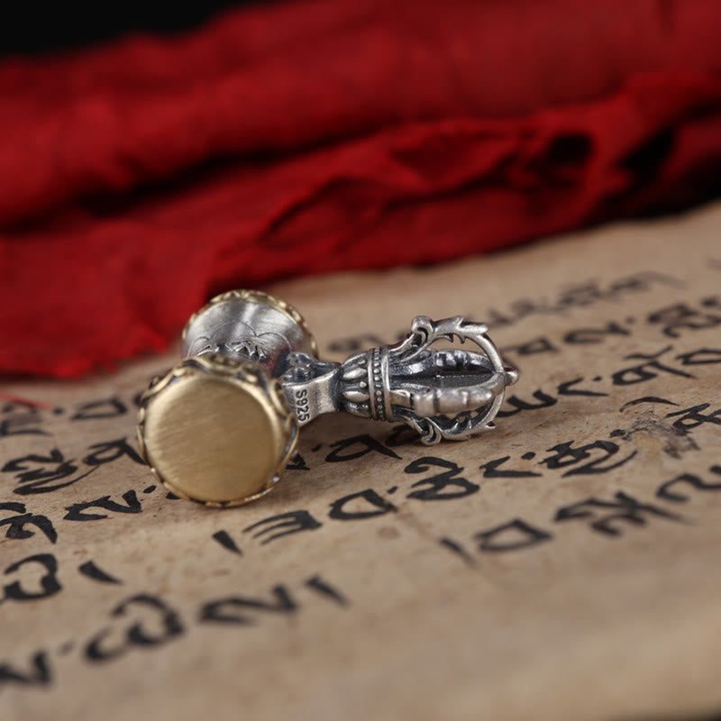 925 Silver Dorje Bell Pendant – Sterling silver vajra with S925 hallmark on Buddhist scripture bg