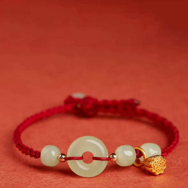 Jade Peace Buckle Lotus Bracelet – close-up of carved jade peace buckle with lotus pod charm detail, Serene