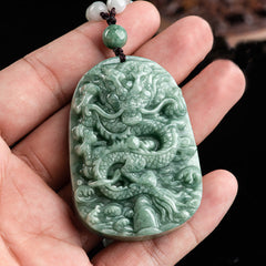 Chinese Zodiac Dragon Jade Necklace - Green jadeite dragon carving held in palm with braided cord, Abundance
