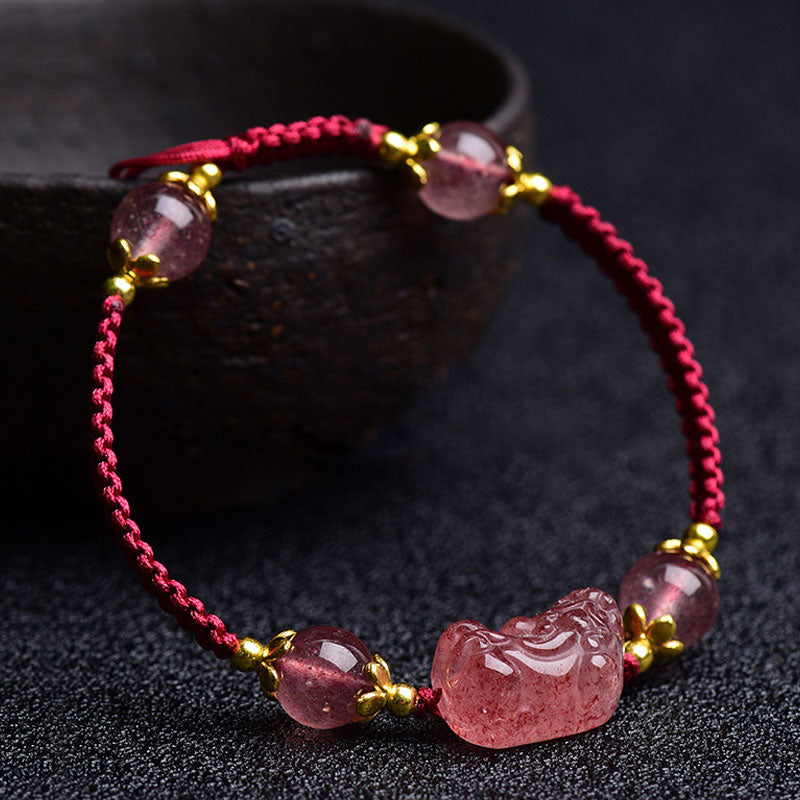 Strawberry Crystal PiXiu Charm Lucky Red String Bracelet – angled side view with braided red cord and PiXiu centerpiece, good luck charm accessory