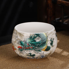 Dragon Cicada Ceramic Tea Bowl - emerald green dragon with vermilion flames on textured cream glaze, traditional chawan style