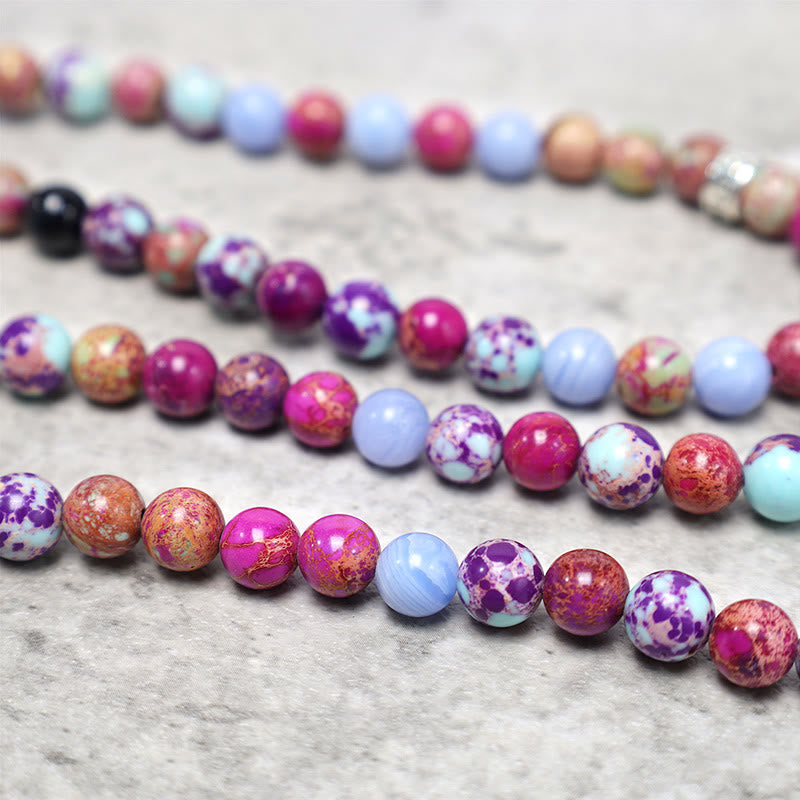 Purple Miano Real Stone Lotus Mala – macro detail of marbled purple and blue stone beads, chakra healing