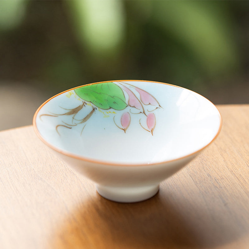 Mandala Koi Teacup – Close-up of colorful koi fish artwork on white ceramic surface