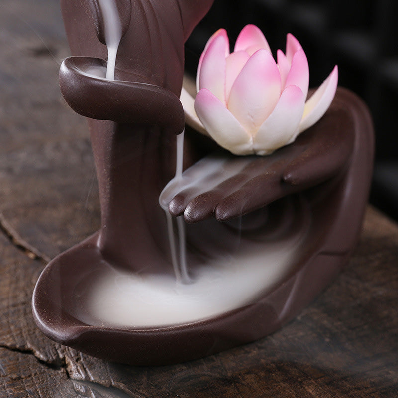Tibetan Lotus Incense Burner – Purple clay Buddha hand with lotus design, zen meditation