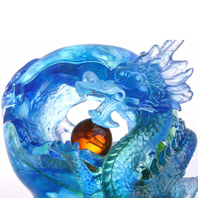 Azure Dragon Liuli Crystal – close-up amber pearl radiating through azure dragon coils, luxury