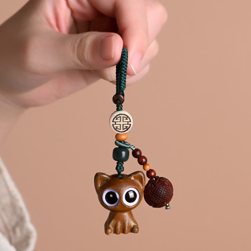 Green Sandalwood Phone Charm – studio soft box lighting, koi fish and lucky cat front